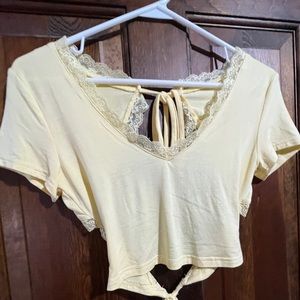 Yellow open back soft shirt